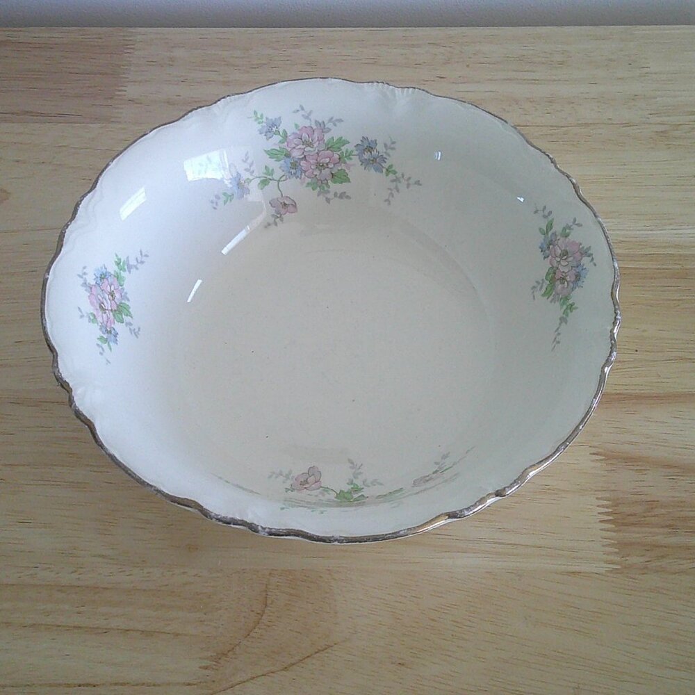 The Homer Laughlin Virginia Rose pattern serving bowl is an elegant and vintage